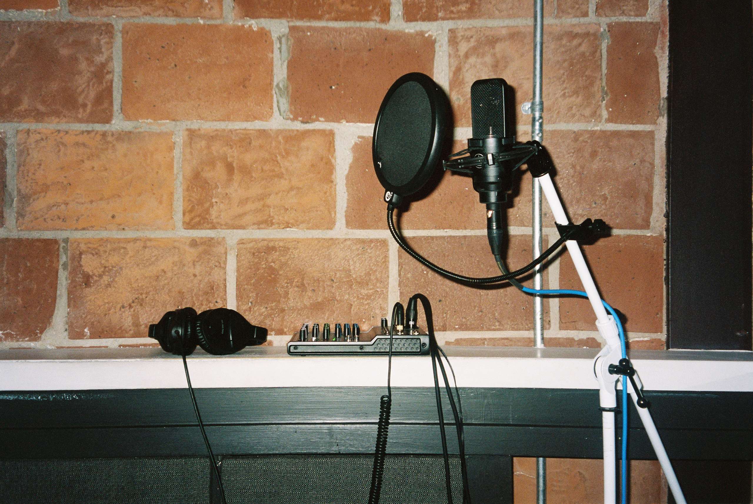 microphone with stand in a home recording studio