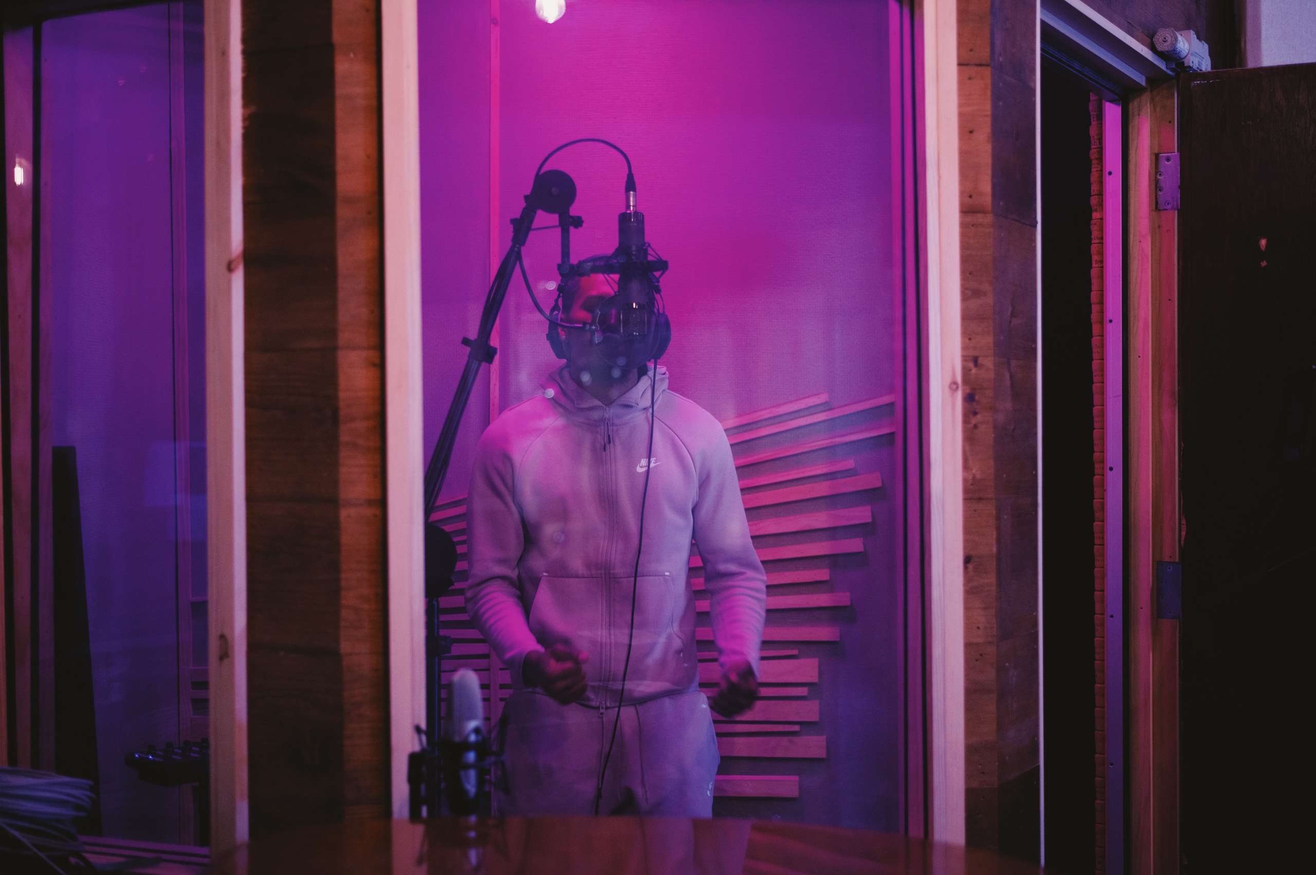 isolated vocal booth recording in a home studio, artist recording orginal vocal samples