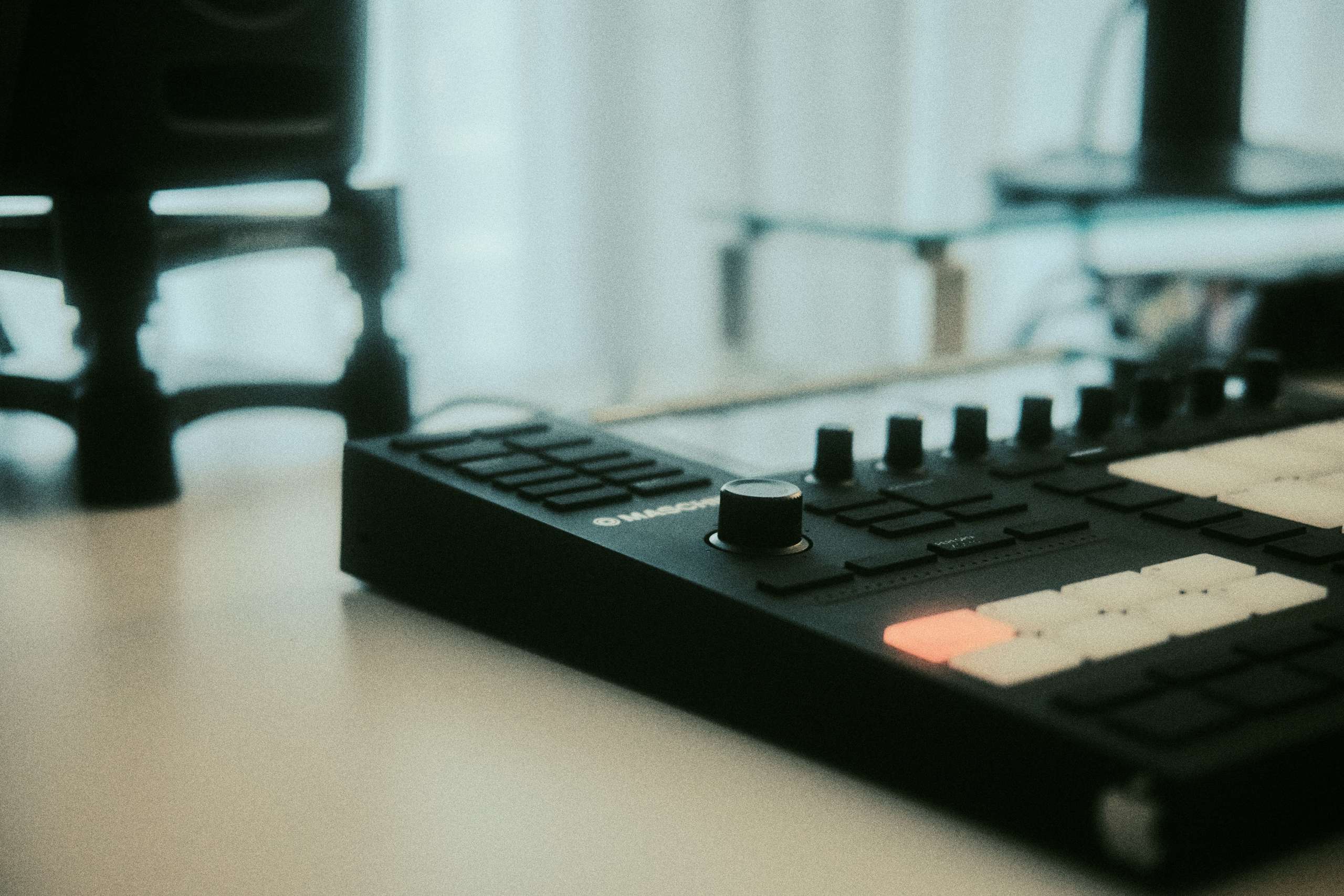 close-up of native instruments machine mk3 controller sampling
