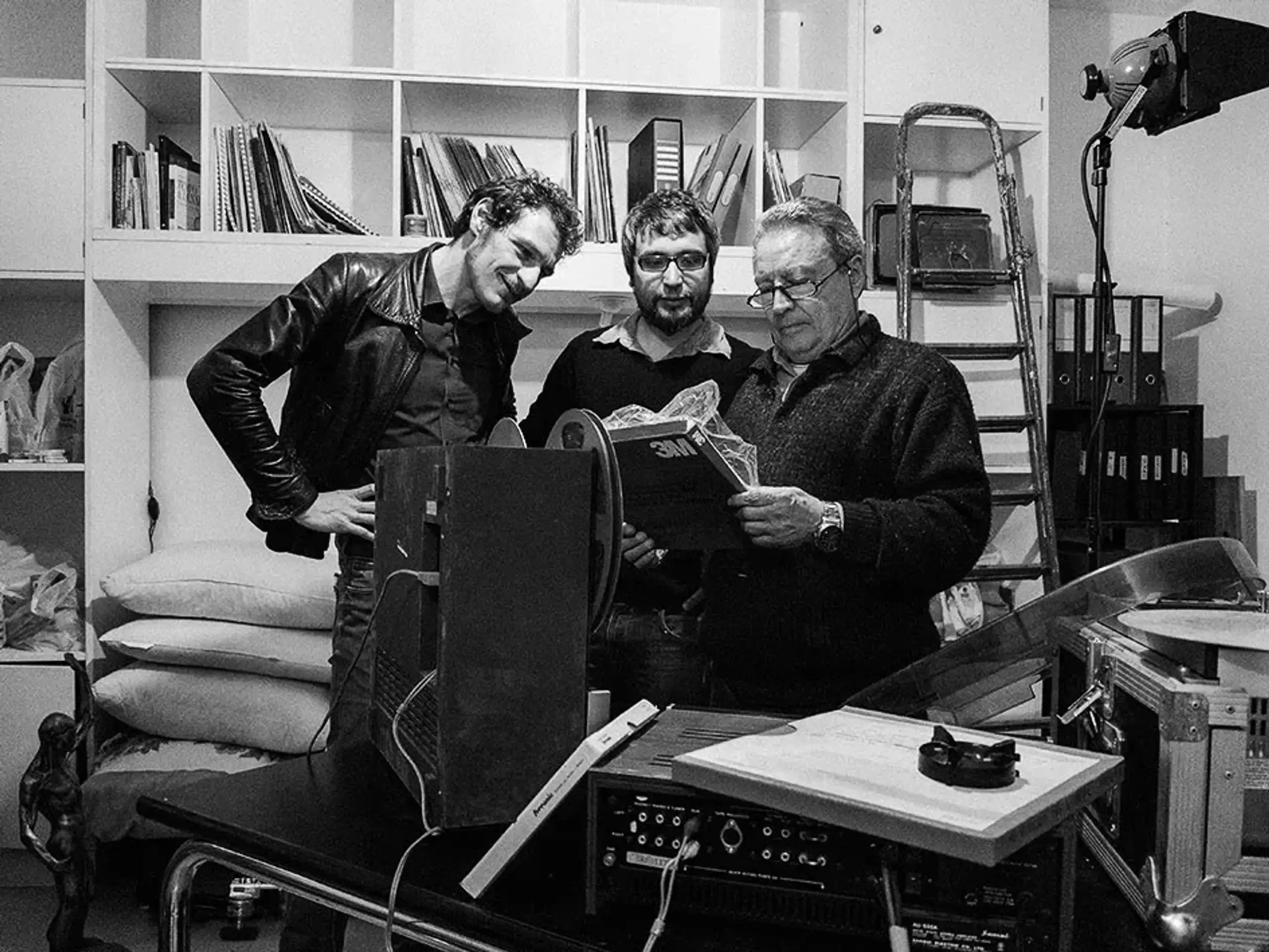 Andrea Fabrizii (A&R at Four Flies - left), Pierpaolo De Sanctis (founder of Four Flies - middle) & composer Giuliano Sorgini (right) in Sorgini's basement